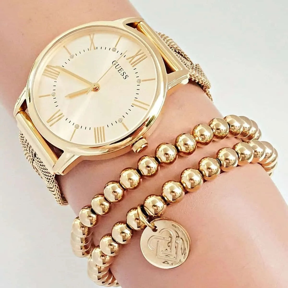 watches GUESS Women's Stainless Steel Analog Watch - W1143L2