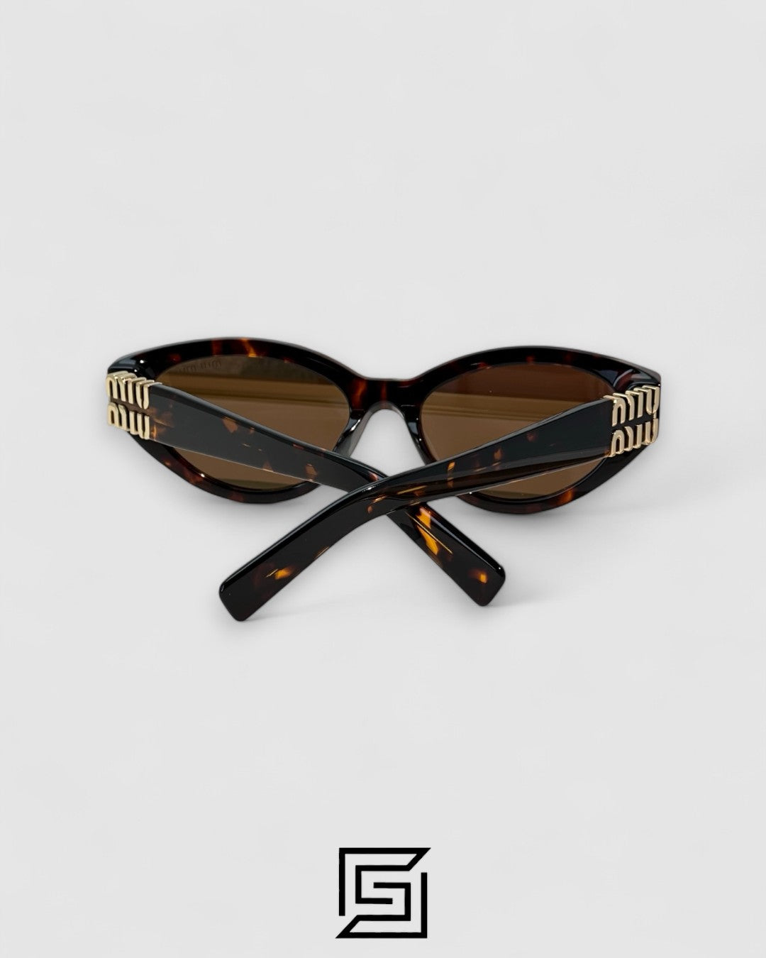 Miu Miu MUA04 14L60M Brown Lenses and Tiger Brown Frame With Gold Logo