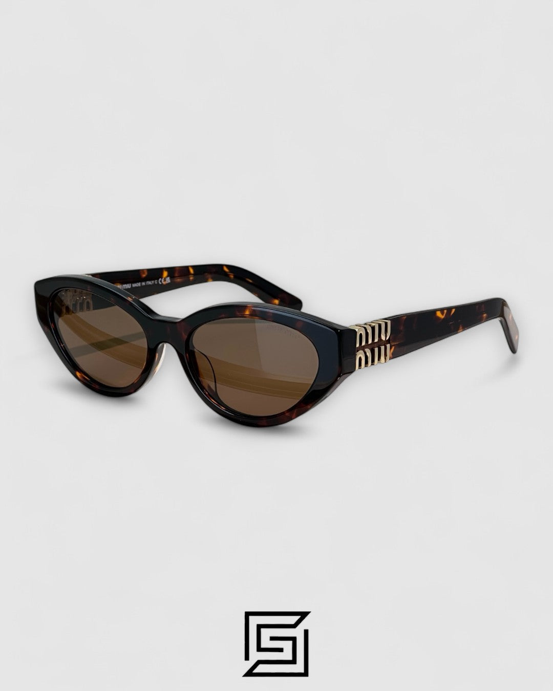 Miu Miu MUA04 14L60M Brown Lenses and Tiger Brown Frame With Gold Logo