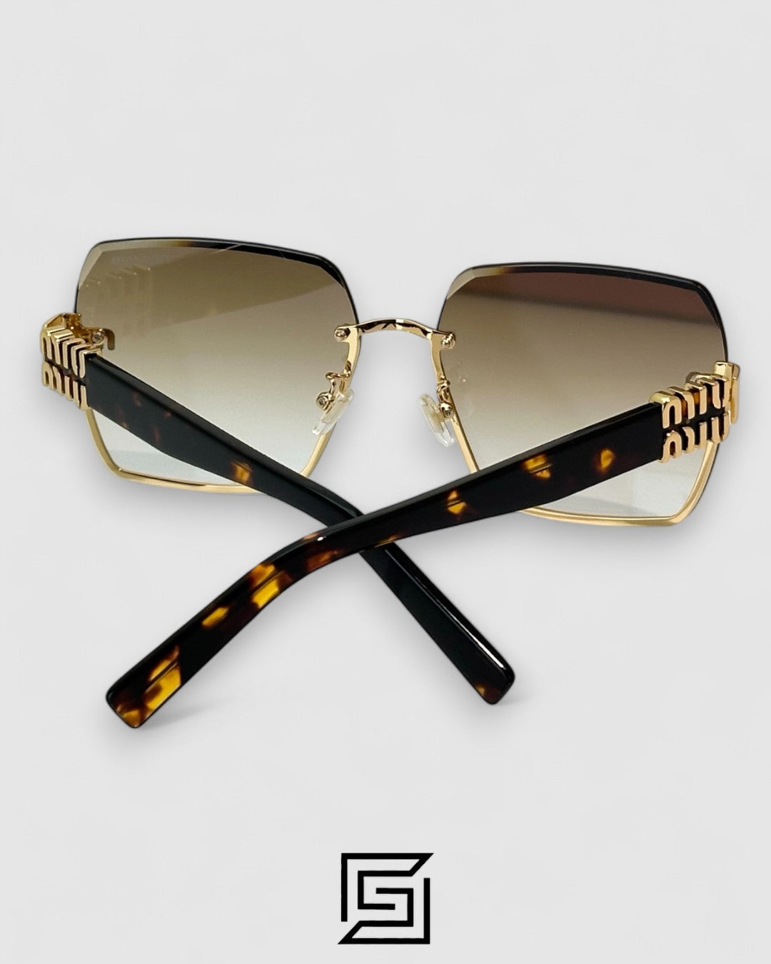 Miu Miu MU60ZS Light Brown Lenses and Gold Frame