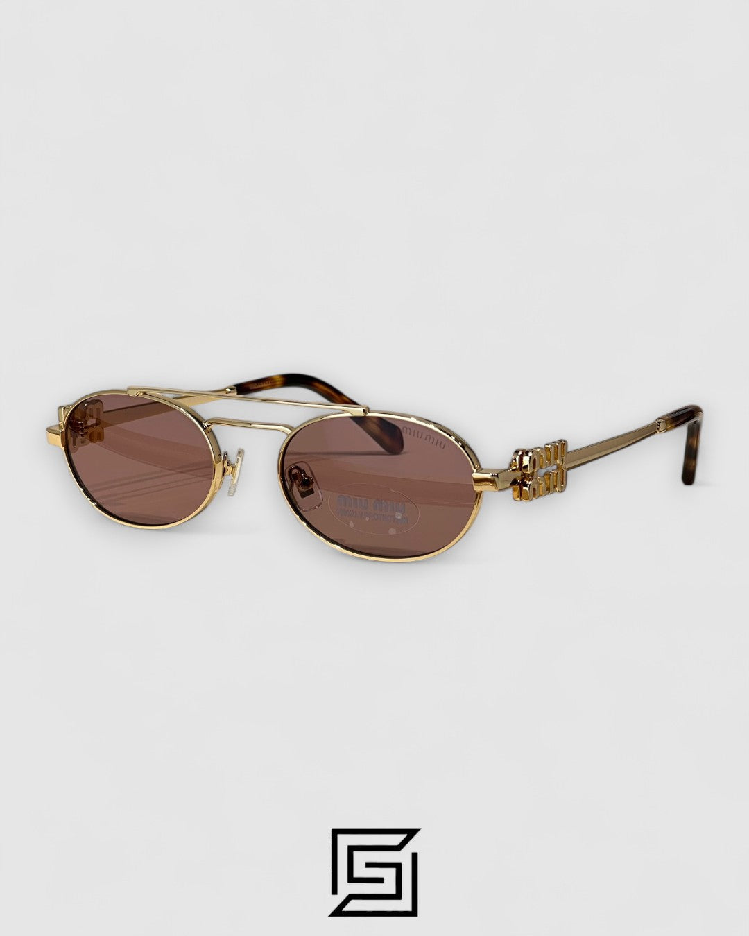 عدسات Miu Miu MU54ZS بنية وإطار ذهبي
