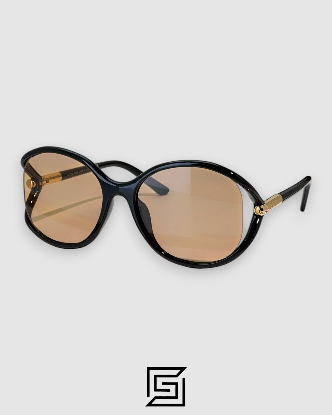 Tom Ford FT1090 عدسات بنية فاتحة وإطار أسود
