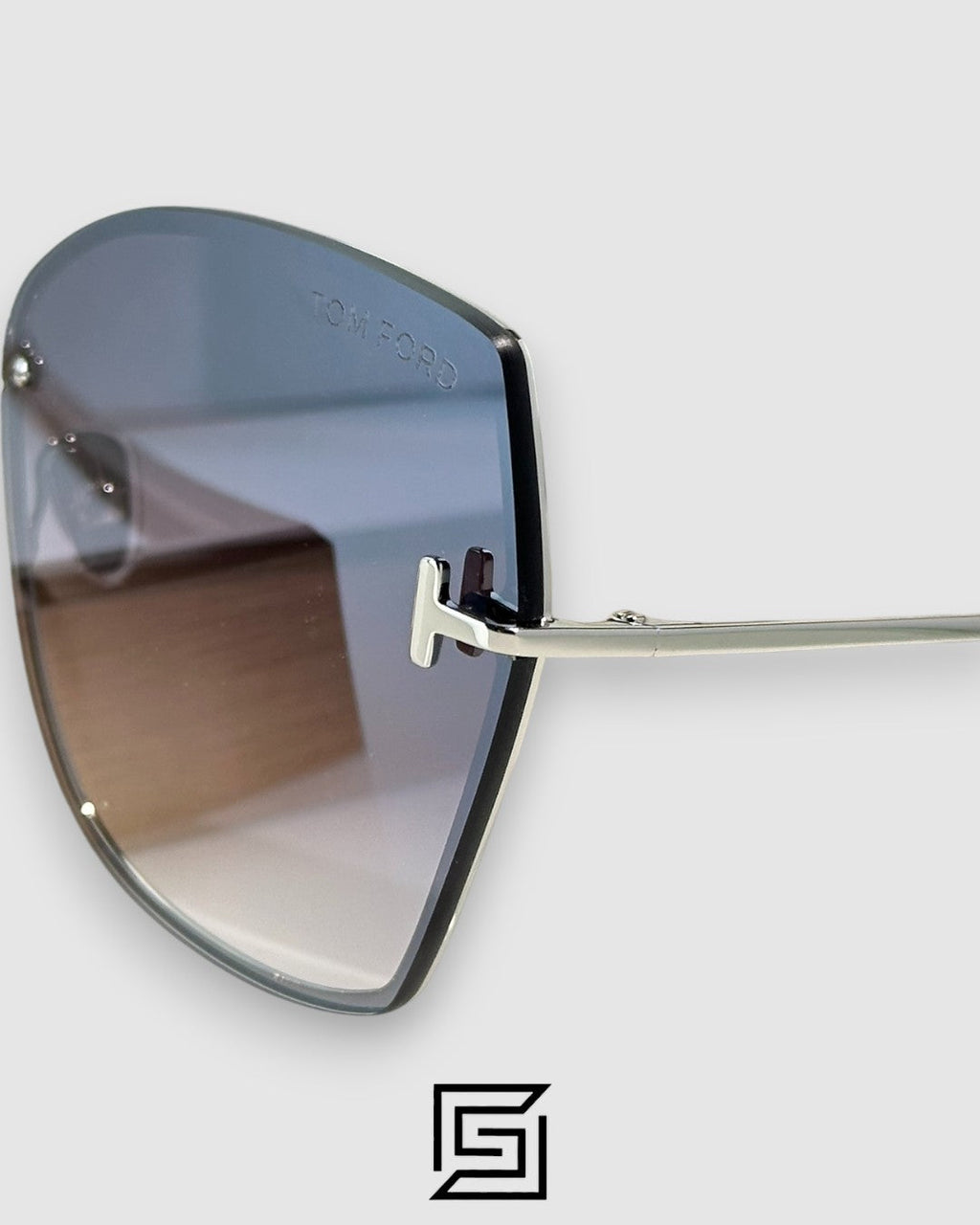 Tom Ford FT1107 عدسات فضية عاكسة وإطار فضي