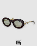 JACQUEMUS 235AC عدسات خضراء فاتحة وإطار أرجواني شفاف