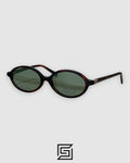 نظارة شمسية Miu Miu SMU04Z بعدسات خضراء وإطار بني بنقشة النمر وشعار ذهبي