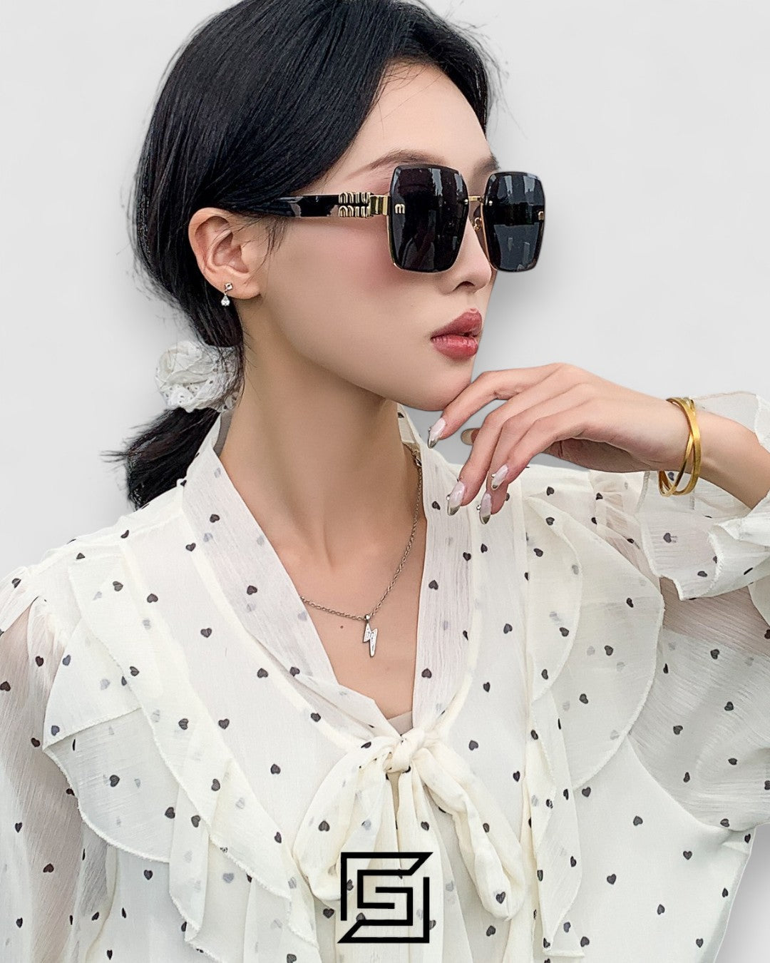 Miu Miu MU60ZS Black Lenses and Gold Frame