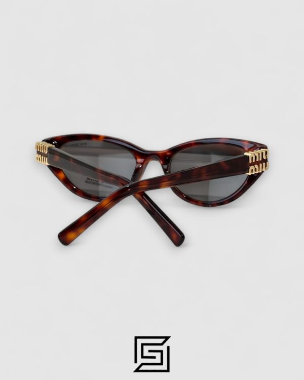 Miu Miu MUA04 21C40 Light Grey Lenses and Tiger Brown Frame With Gold Logo
