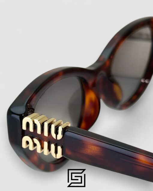 Alternative view of Miu Miu MUA04 21C40 Light Grey Lenses and Tiger Brown Frame With Gold Logo