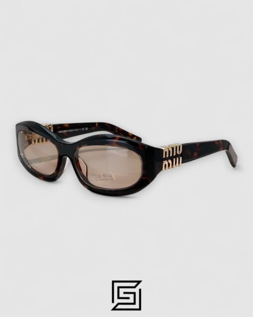 Miu Miu MU14 141-90H Light Brown Lenses and Tiger Brown Frame With Gold Logo