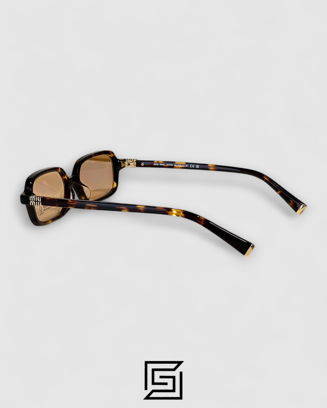 Miu Miu SMU11Z Red Lenses and Tiger Brown Frame - Image 5