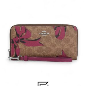 ⁦Coach Outlet Long Zip Around Wallet In Signature Canvas With Bow Print – PinkStyle No. CZ326⁩ - الصورة ⁦1⁩