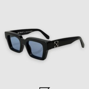Off-White OER126 Blue Lenses sunglasses feature a bold black acetate frame and vibrant blue lenses. Experience the ultimate in streetwear luxury today at ELSWEFY.
